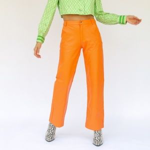 Orange faux leather pants